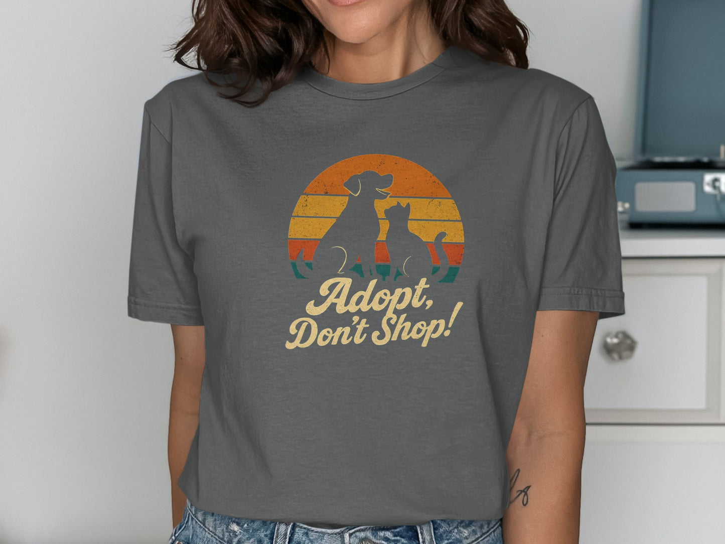 Adopt Don't Shop Graphic Tee product