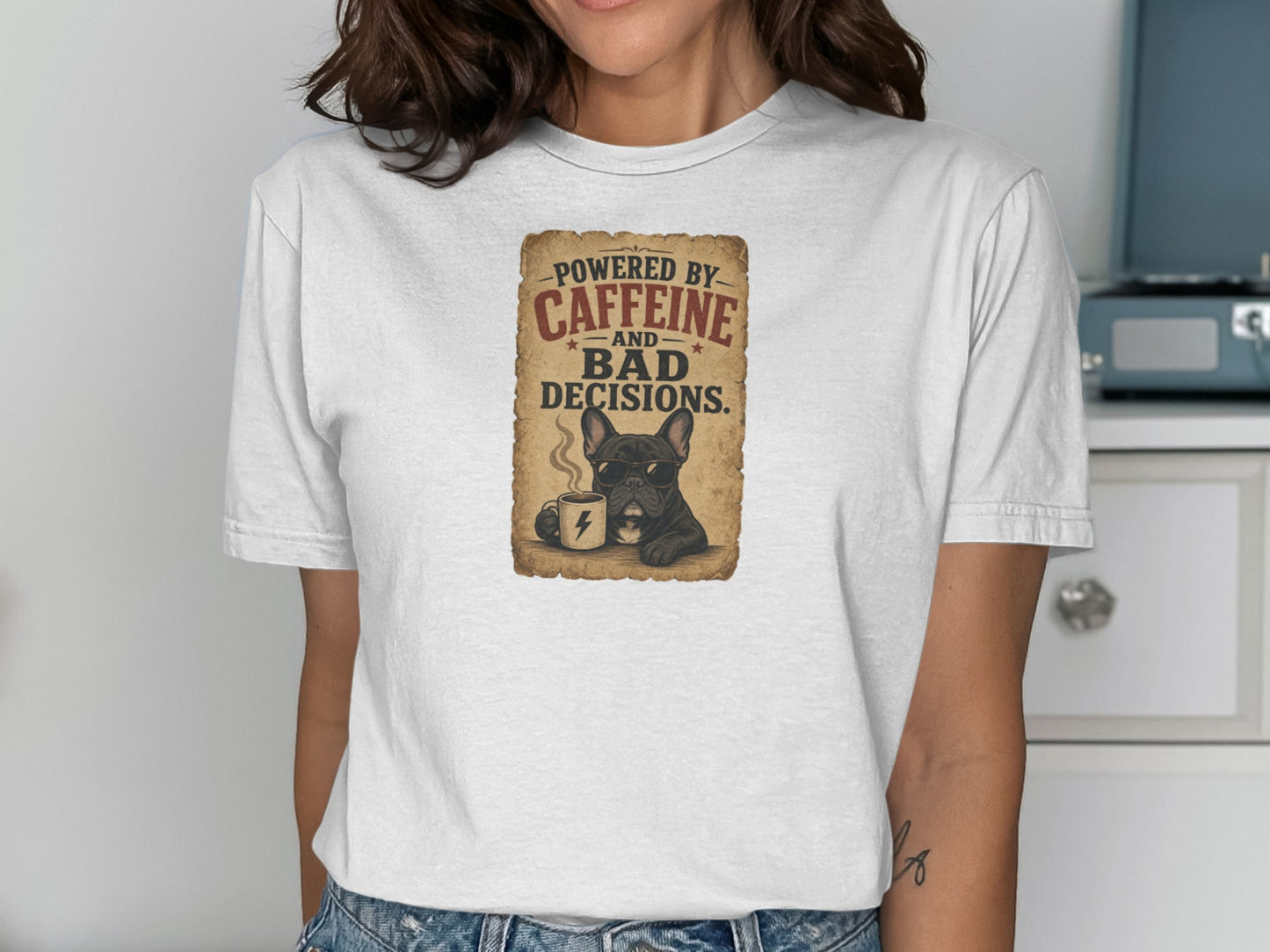 French bulldog wearing sunglasses drinks coffee under "Powered by Caffeine and Bad Decisions" text.