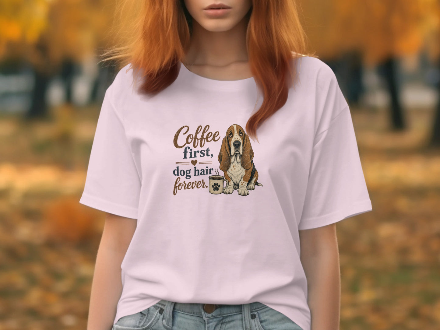 White t-shirt with "Coffee first, dog hair forever" and a basset hound.