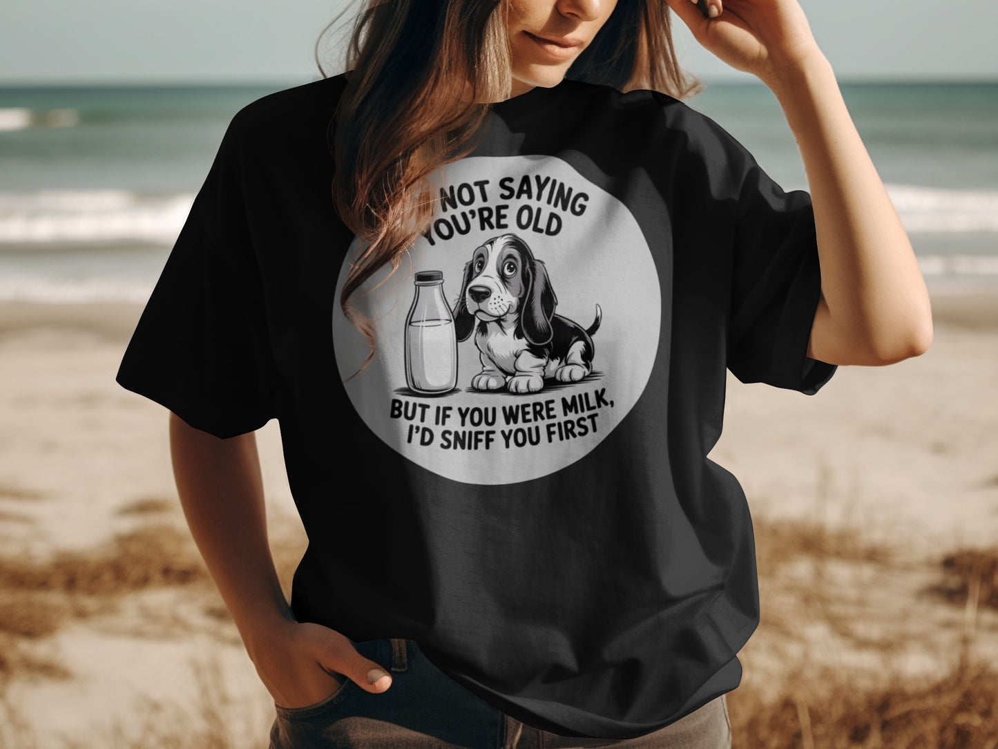 Black t-shirt with a beagle and milk jug graphic and text.