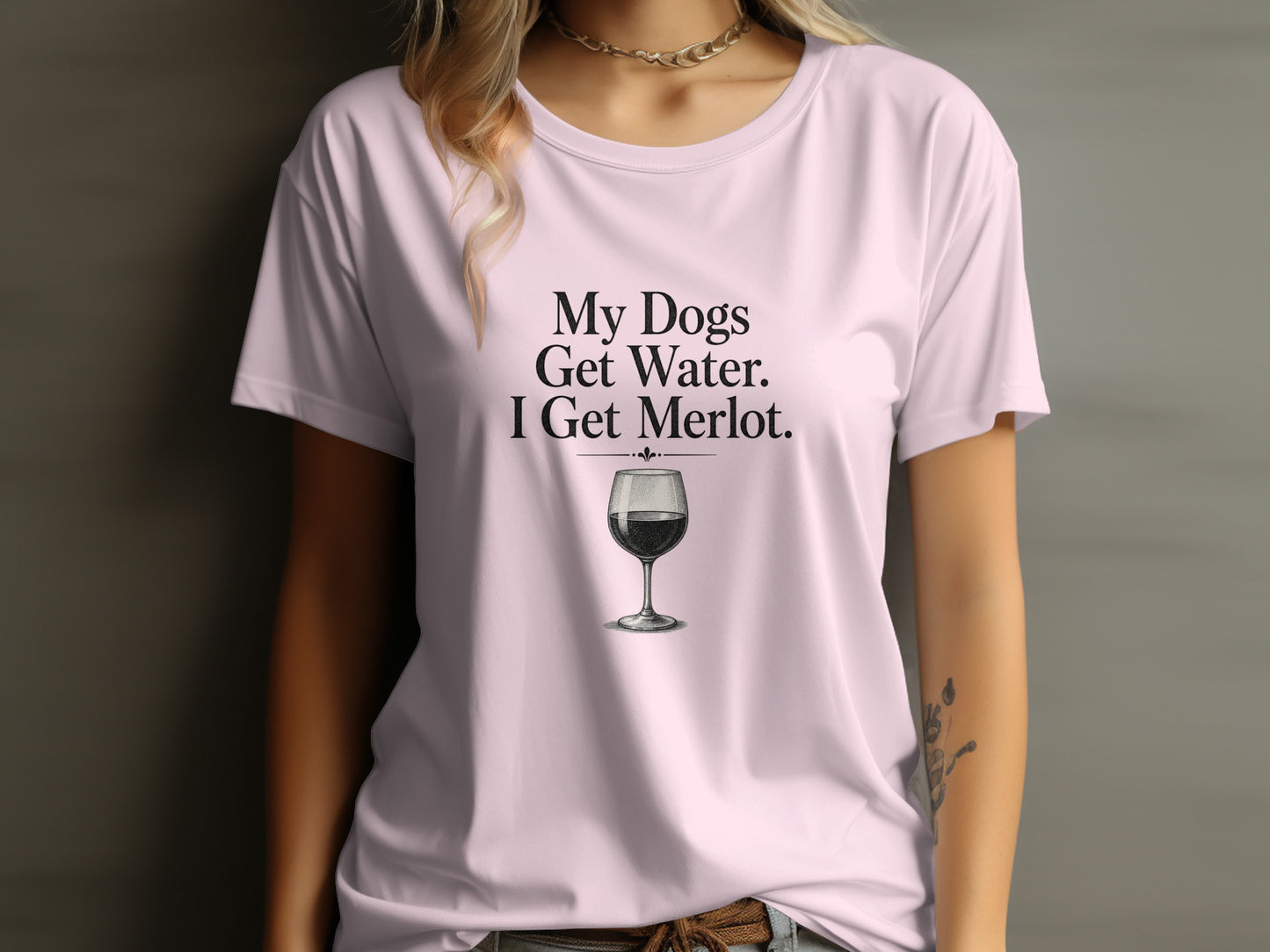 Pink t-shirt with "My Dogs Get Water. I Get Merlot." and wine glass graphic.