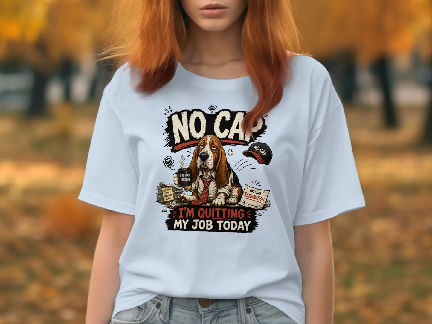 Woman wearing t-shirt with text "NO CAP I'M QUITTING MY JOB TODAY" and a dog.