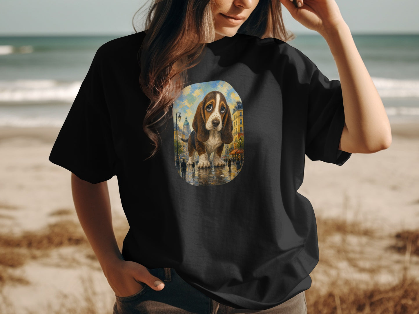 Black t-shirt with a painting of a Basset Hound on a wet cobblestone street.