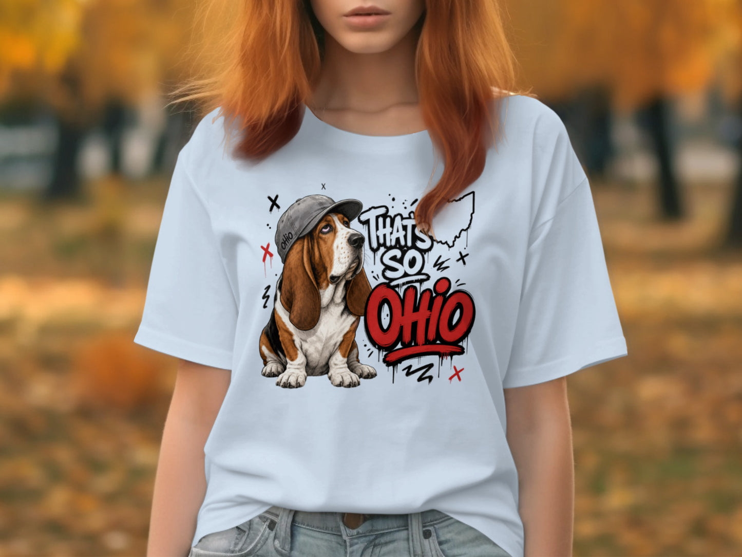 Graphic t-shirt with a cartoon dog wearing a hat and "That's So Ohio" text.