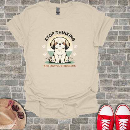 T-shirt with a cartoon dog looking grumpy, text "STOP THINKING AND END YOUR PROBLEMS".