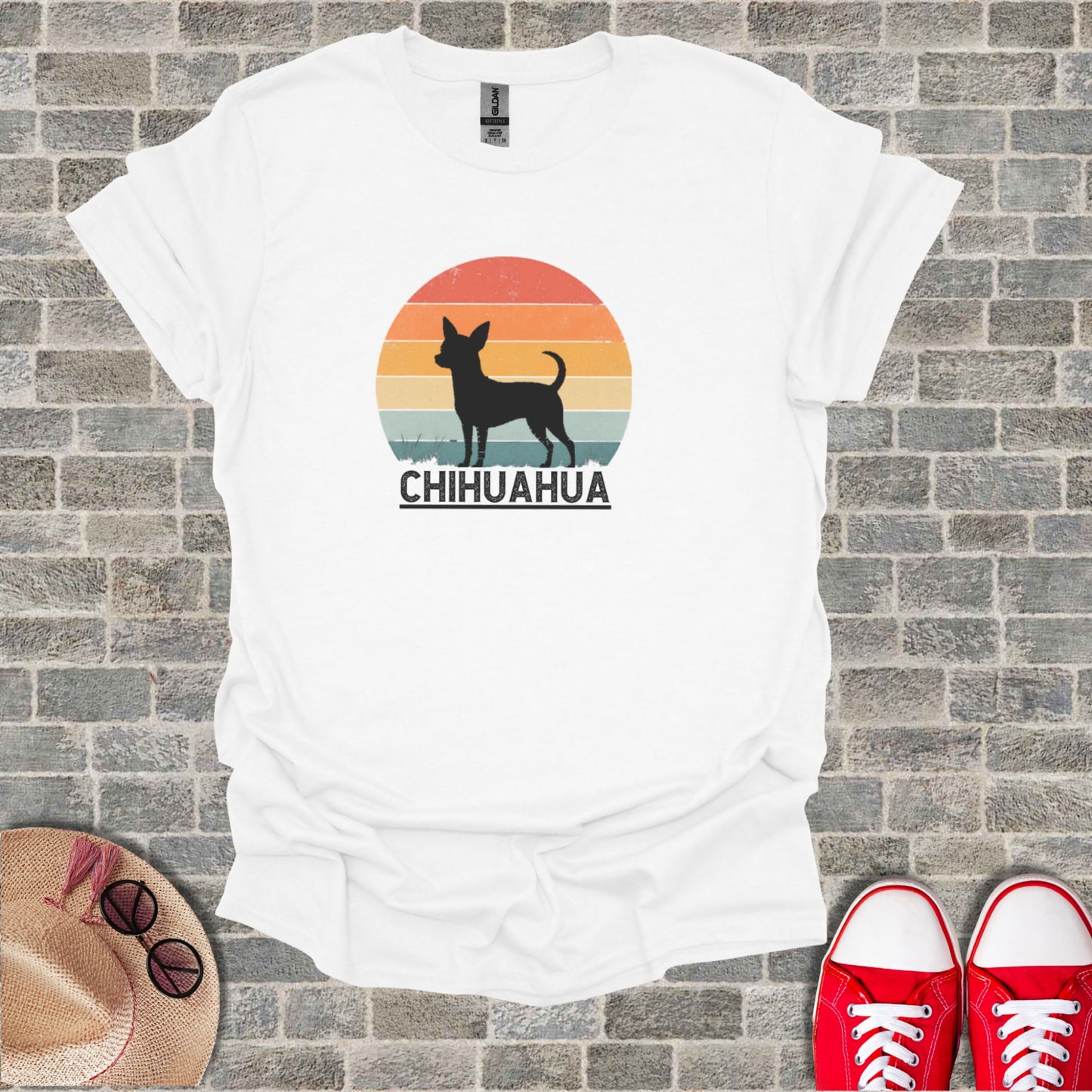 White t-shirt with black chihuahua silhouette and "CHIHUAHUA" text against a sunset.