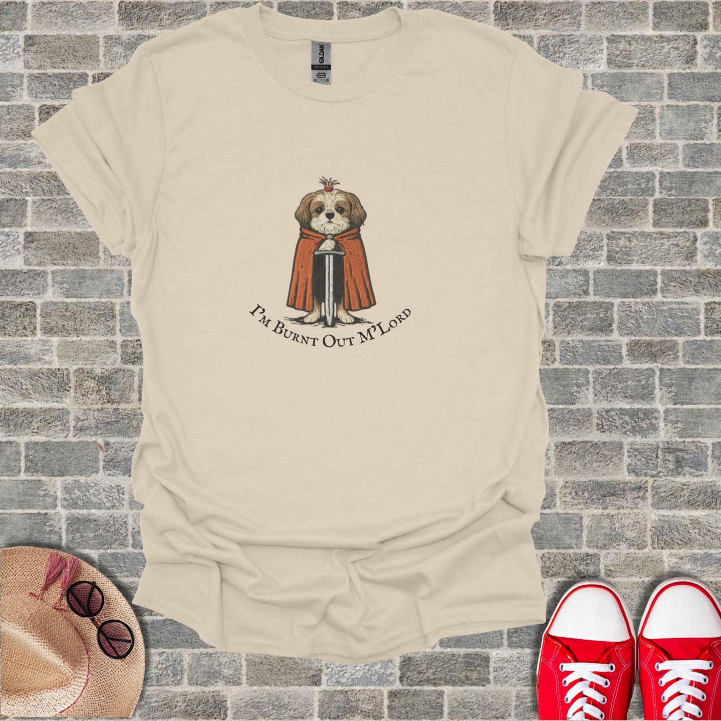 Shih Tzu dog wearing a cape and crown, "I'm Burnt Out M' Lord" text.