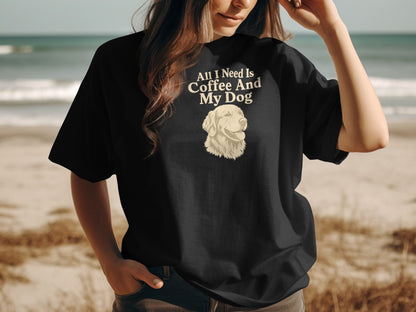 Black t-shirt with text "All I Need Is Coffee And My Dog" and a golden retriever illustration.