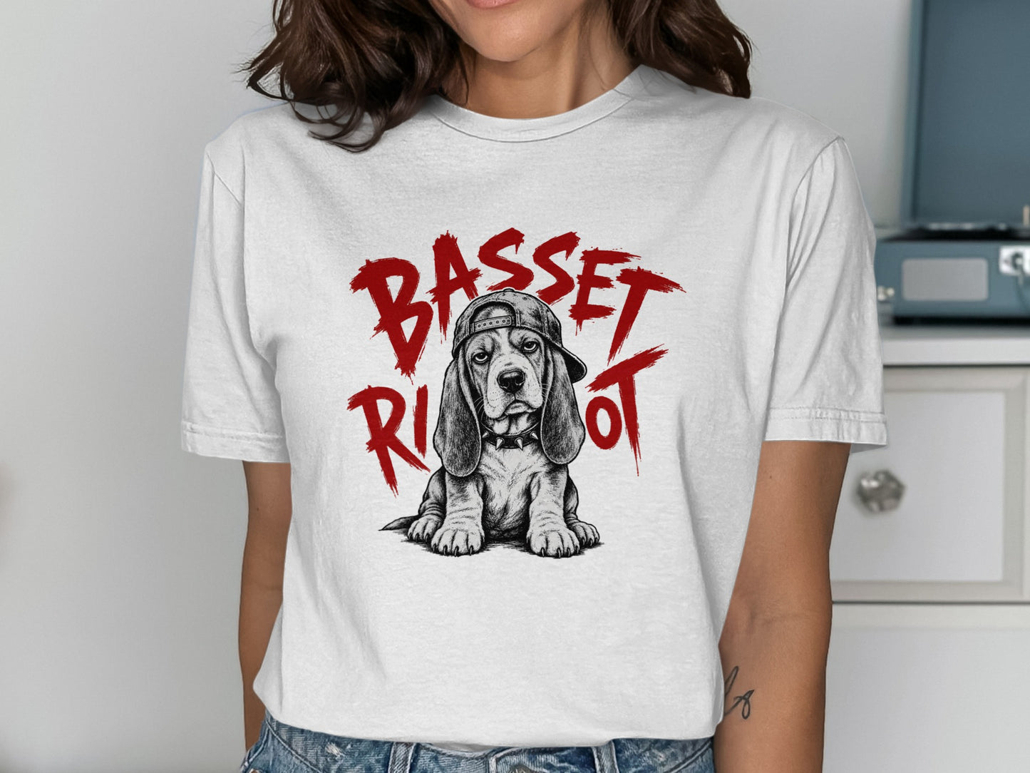 Basset hound wearing a baseball cap, text reads BASSET.