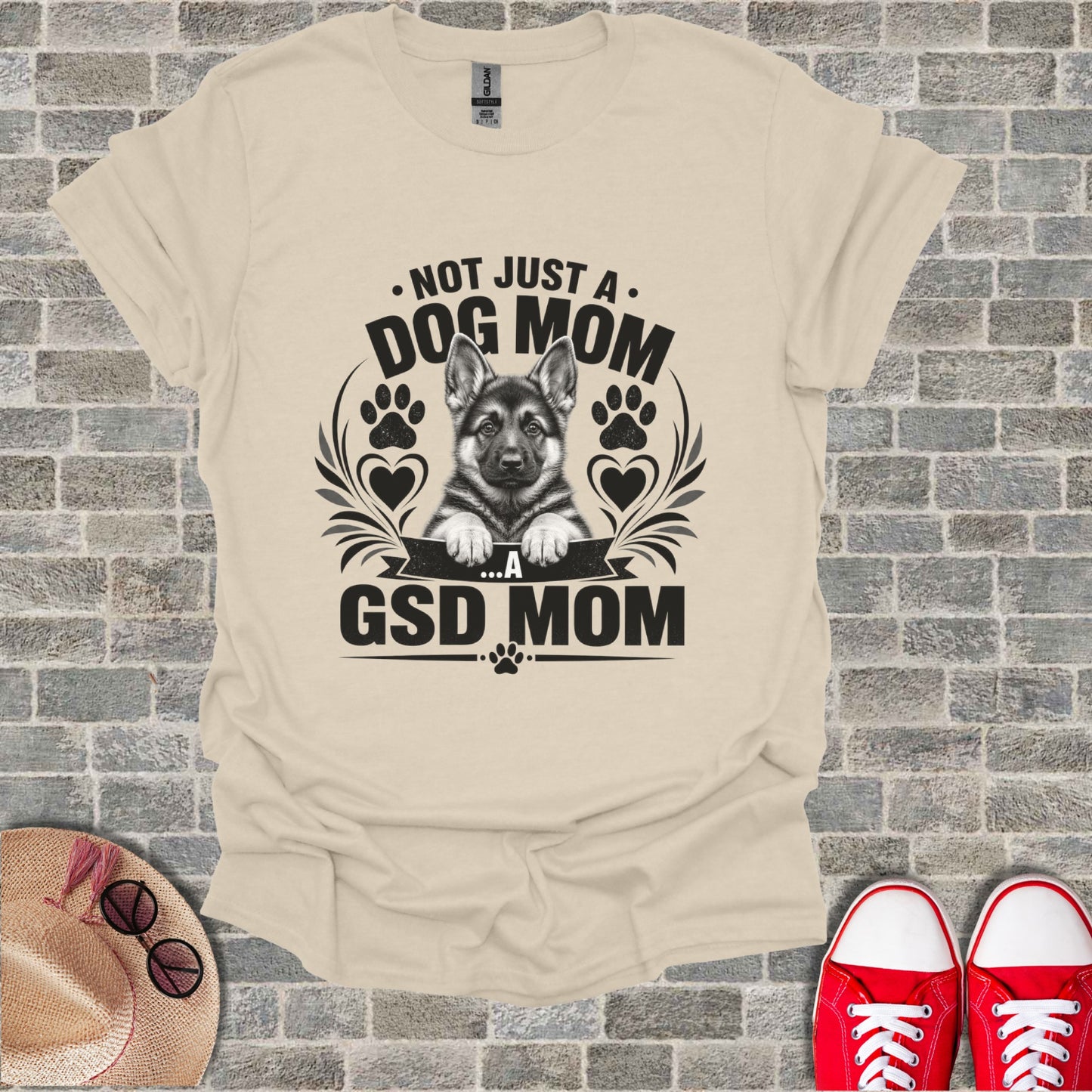 Cream t-shirt with black text and German Shepherd puppy graphic.