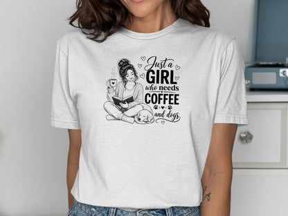 T-shirt with "Just a girl who needs coffee and dogs" text and illustration.