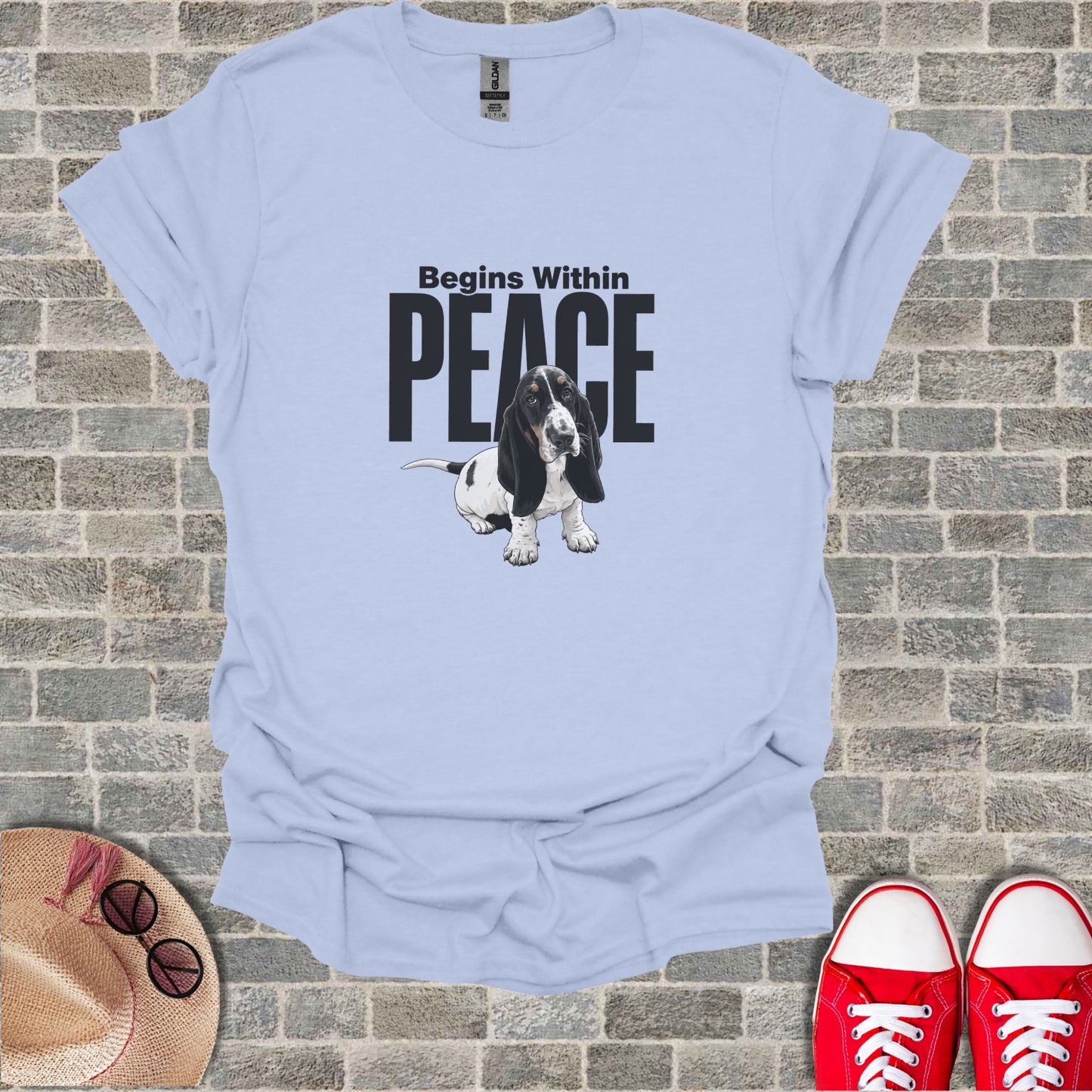 Light blue t-shirt with "Begins Within Peace" text and Basset Hound graphic.