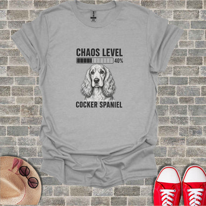 Grey t-shirt with Cocker Spaniel graphic, loading bar, and text "CHAOS LEVEL 40% Cocker Spaniel".
