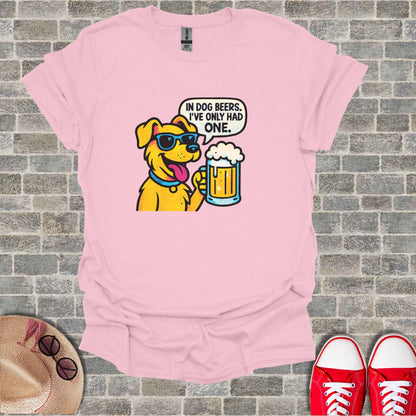 Yellow cartoon dog wearing sunglasses, holding a beer mug, with text "IN DOG BEERS, I'VE ONLY HAD ONE."