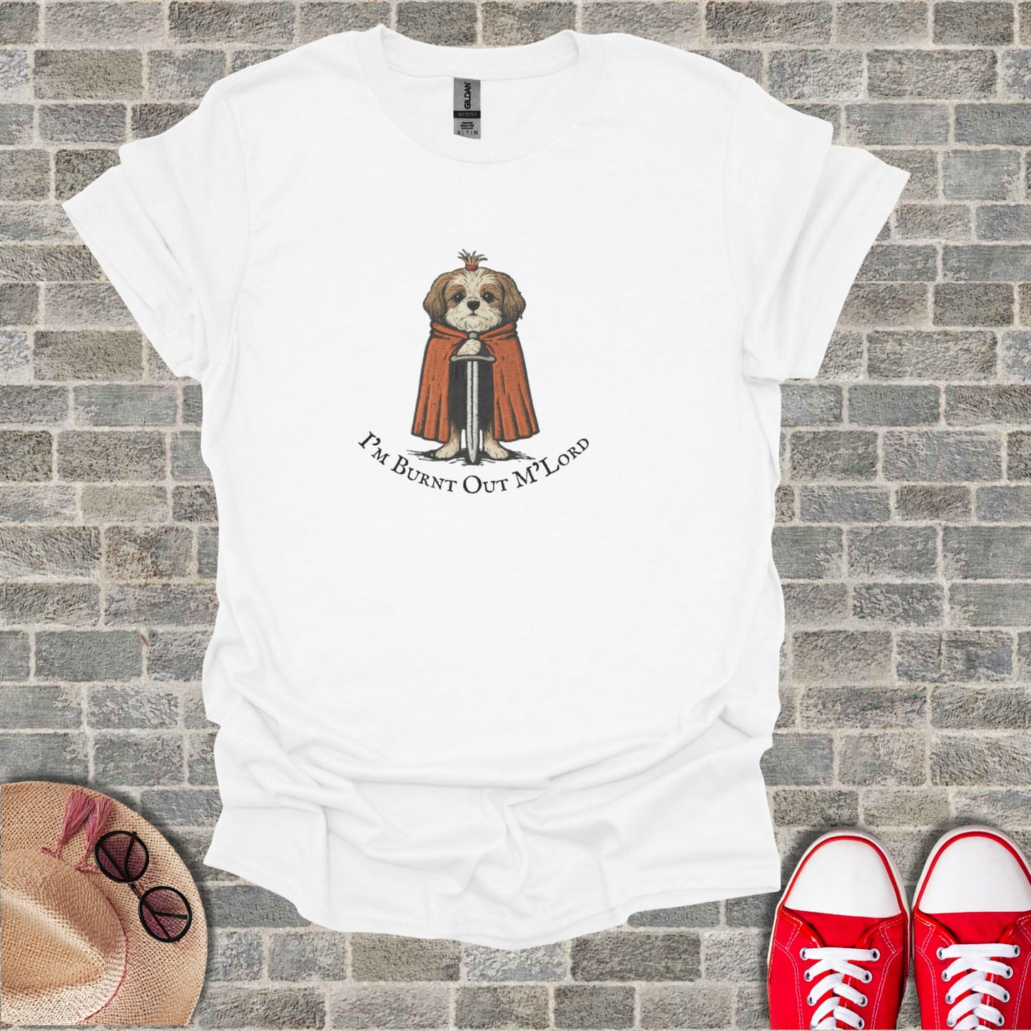 White t-shirt with a cartoon dog wearing a cape and crown, text says "I'M BURNT OUT M'LORD".
