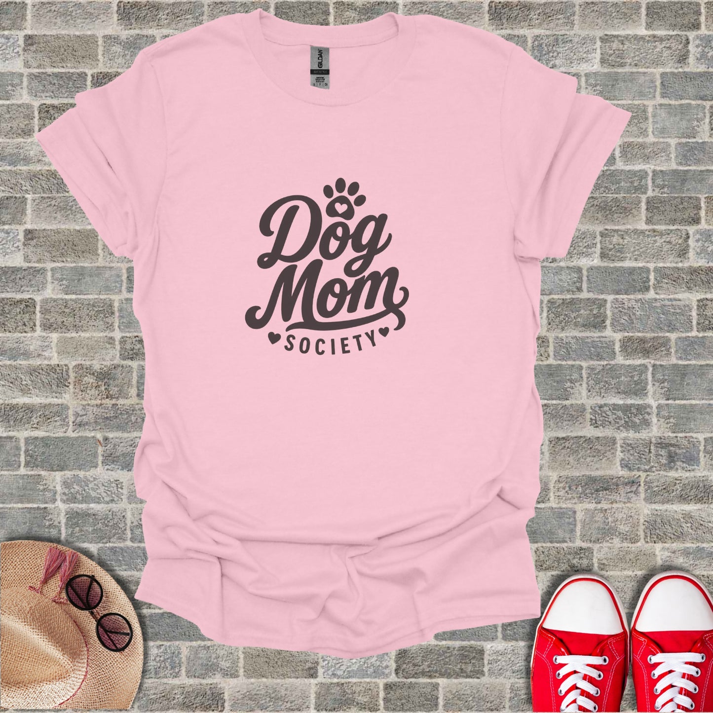 Pink t-shirt with "Dog Mom Society" text and small heart accent.