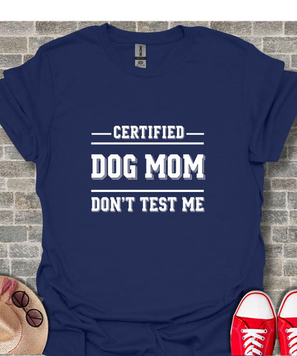 Navy t-shirt with white text that reads "CERTIFIED DOG MOM DON'T TEST ME".