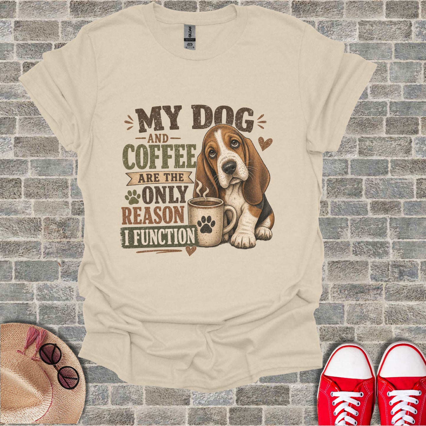 Cream t-shirt with "My Dog and Coffee are the only reason I function" graphic.