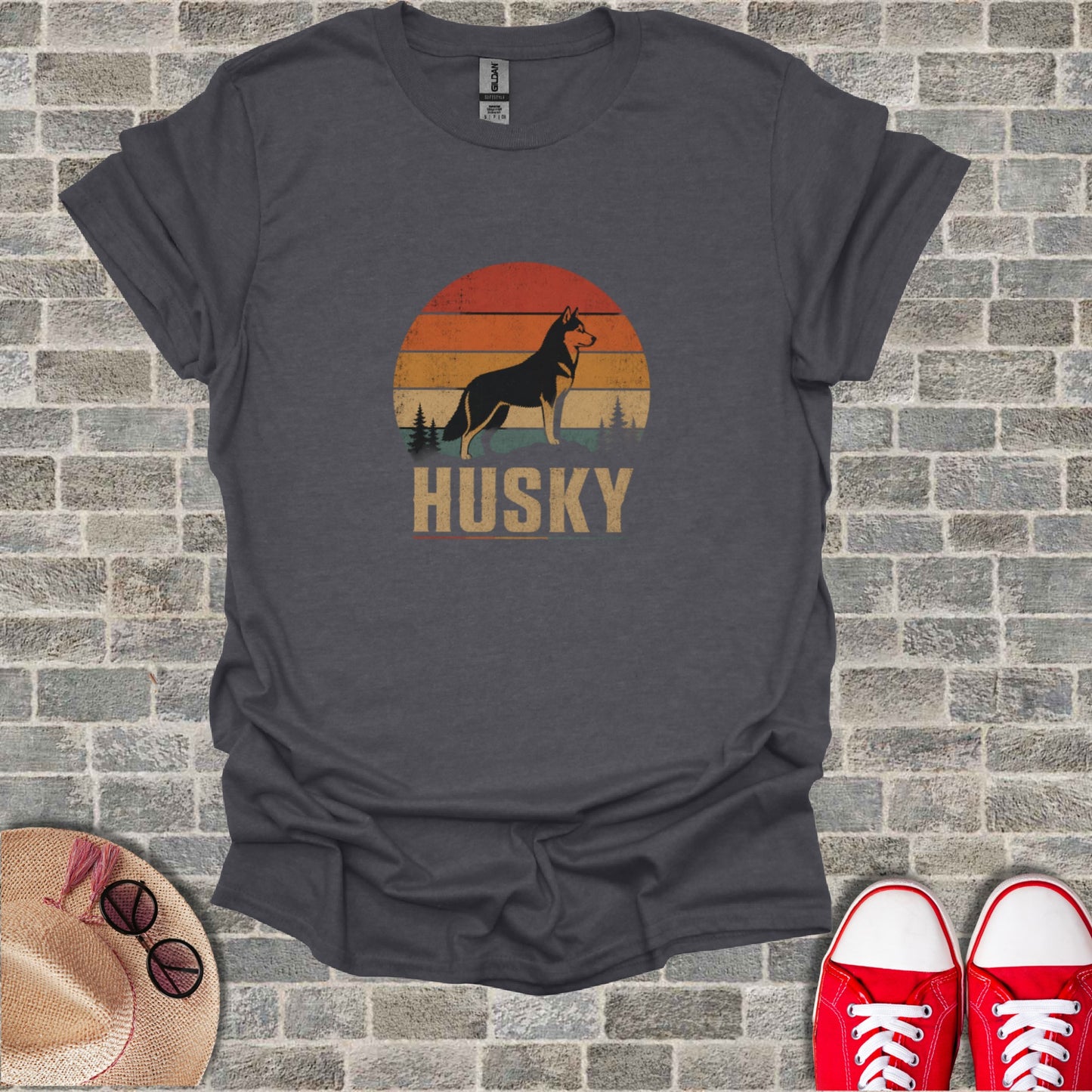 Dark grey t-shirt with retro husky silhouette and sunset graphic.