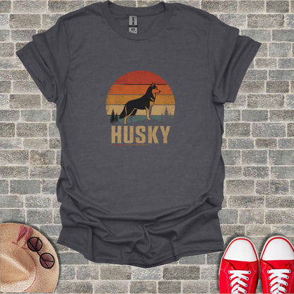 Dark grey t-shirt with retro husky silhouette and sunset graphic.