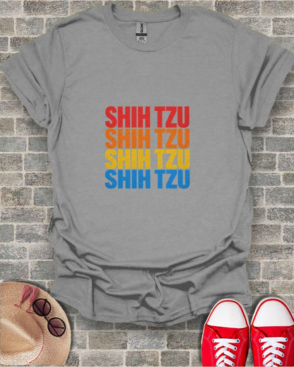 Grey t-shirt with "SHIH TZU" in orange, yellow, and blue text.