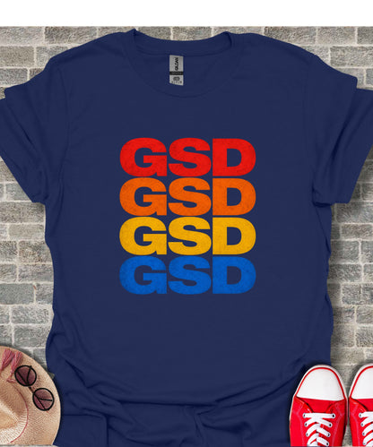 Navy t-shirt with "GSD" repeated four times in red, orange, yellow, and blue.
