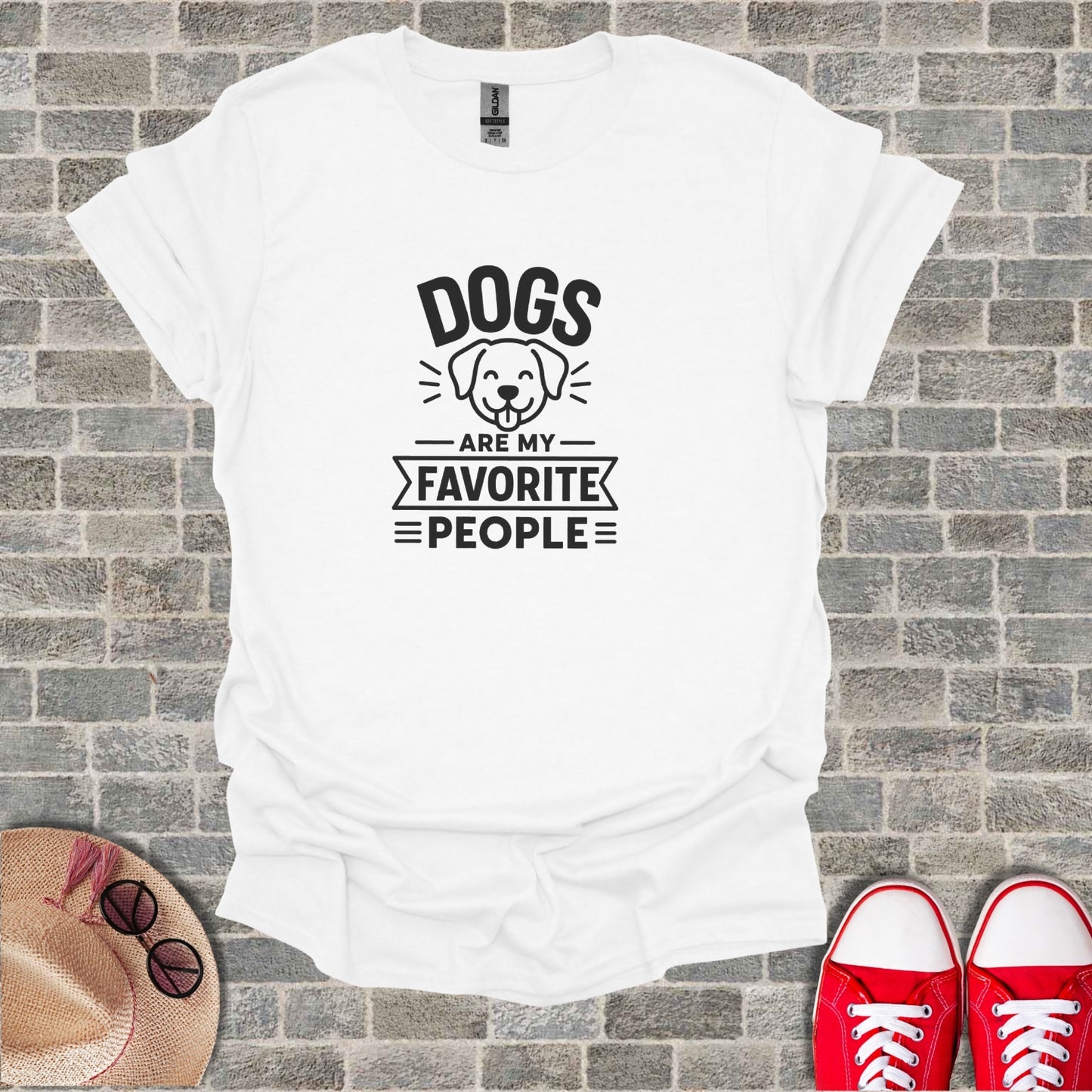 White t-shirt with "Dogs are my favorite people" graphic.