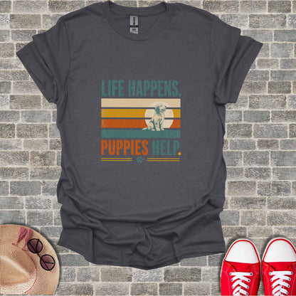 Dark grey t-shirt with "LIFE HAPPENS, PUPPIES HELP" text and a dog graphic.