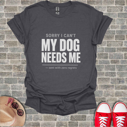 Dark grey t-shirt with "Sorry I can't my dog needs me" text.