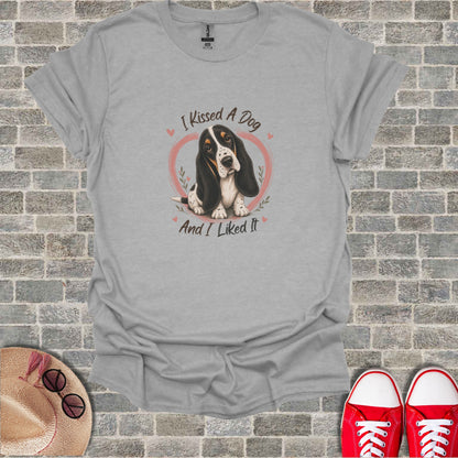 Gray t-shirt with a Basset Hound graphic and the text "I KISSED A DOG AND I LIKED IT".