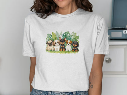 Watercolor illustration of five small dogs sitting in front of green leaves.