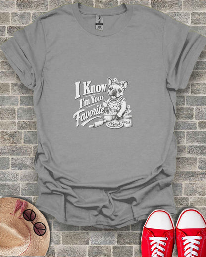 T-shirt graphic with French bulldog in apron with "I Know Your Favorite" text.