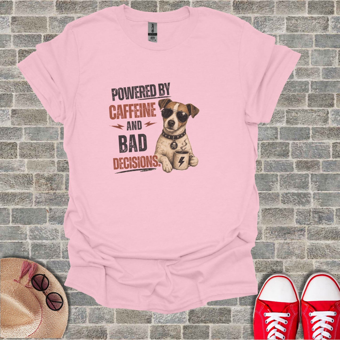 Pink t-shirt with "Powered by Caffeine and Bad Decisions" and a dog.