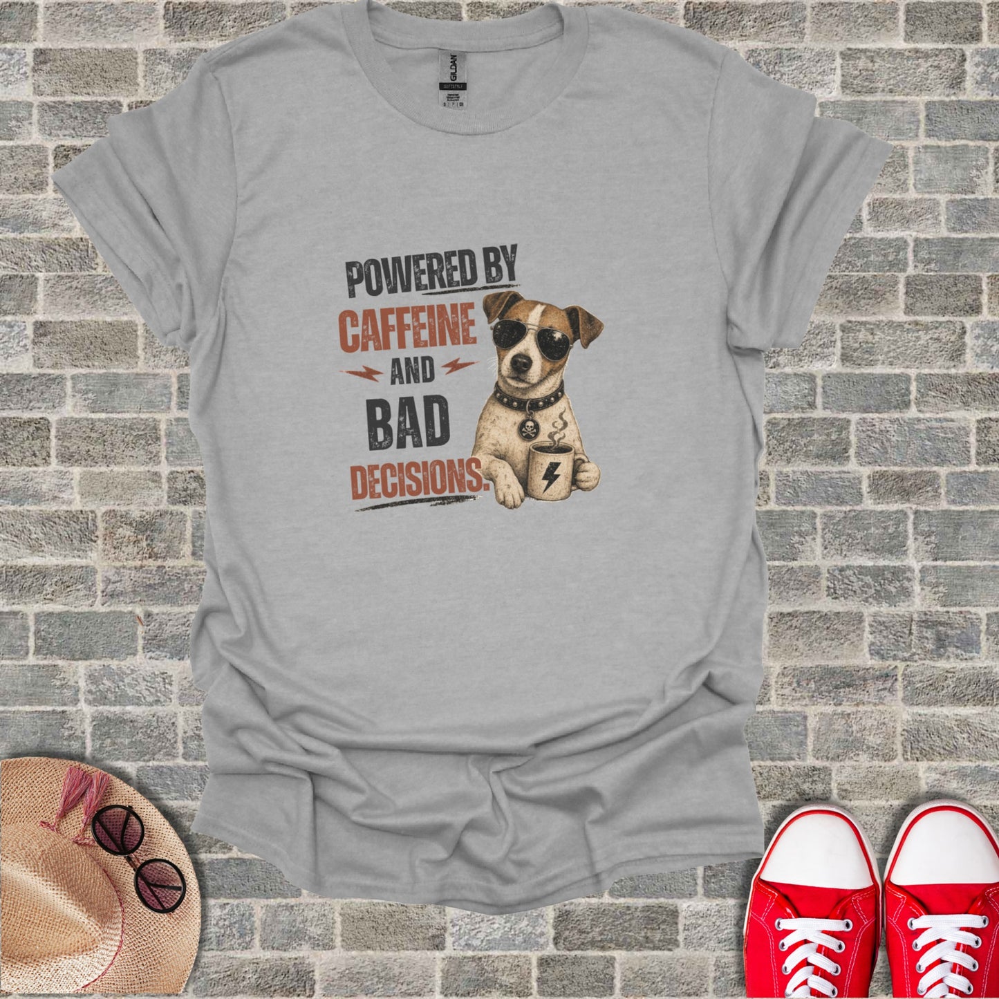 Grey t-shirt with a dog and text "POWERED BY CAFFEINE AND BAD DECISIONS".