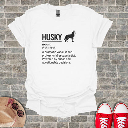 White t-shirt with black text and husky graphic: "HUSKY noun. (huhs-kee) A dramatic vocalist and professional escape artist. Powered by chaos and questionable decisions."