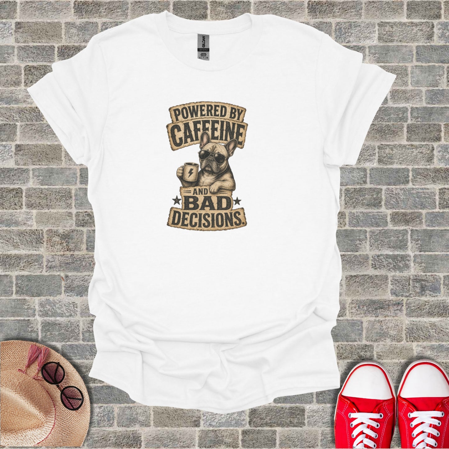 White t-shirt with "Powered by Caffeine and Bad Decisions" graphic featuring a French bulldog.