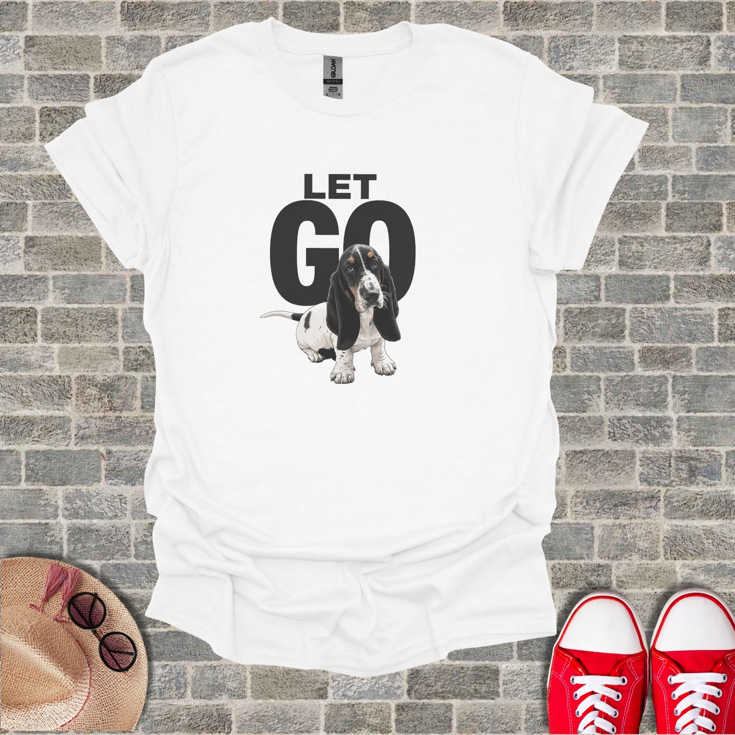 White t-shirt with "LET GO" and a basset hound graphic.