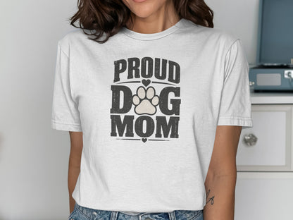White t-shirt with black text reading "PROUD DOG MOM" and a paw print.