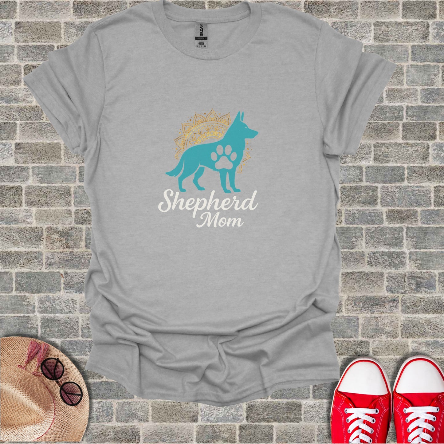 Grey t-shirt with "Shepherd Mom" text and dog paw logo.