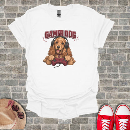 White t-shirt with a cartoon dog wearing headphones and holding a video game controller.