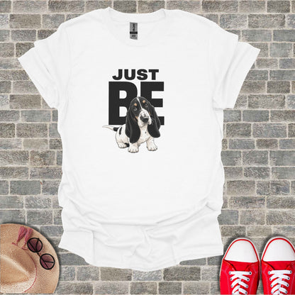 White t-shirt with Basset Hound dog and "JUST BE" text.