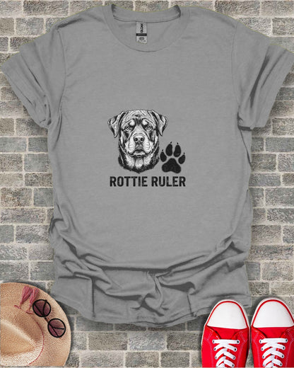 Grey t-shirt with Rottweiler and paw print graphic.