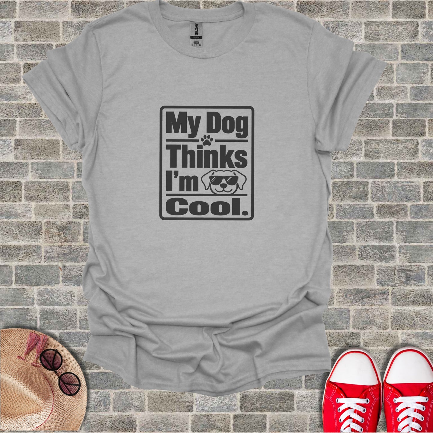 Gray t-shirt with "My Dog Thinks I'm Cool." text and sunglasses graphic.