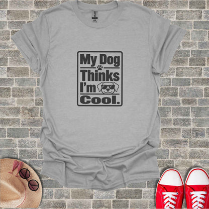 Gray t-shirt with "My Dog Thinks I'm Cool." text and sunglasses graphic.