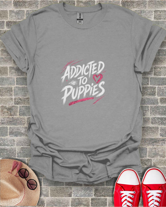 Gray t-shirt with "Addicted to Puppies" text and heart graphic.