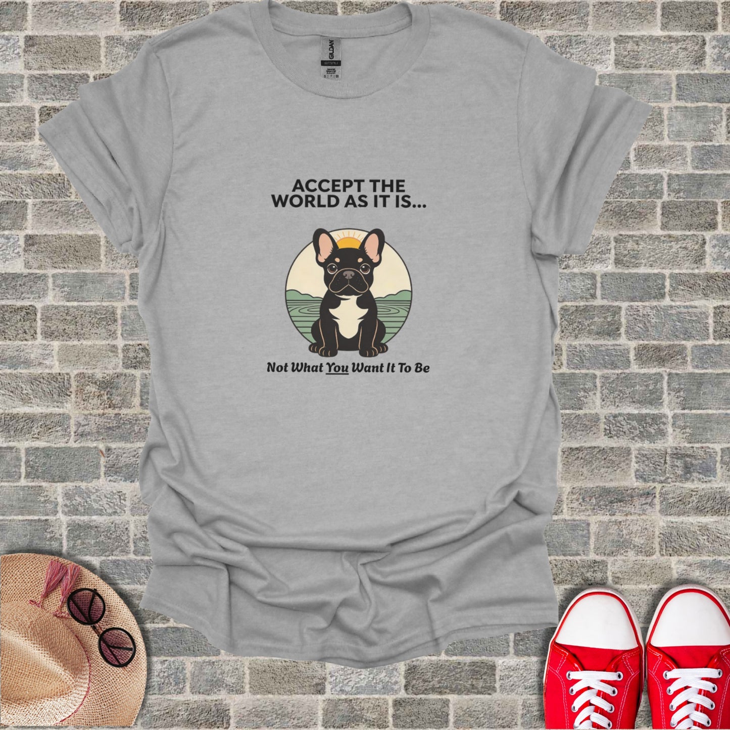French bulldog sitting in front of a circular sunburst with text.