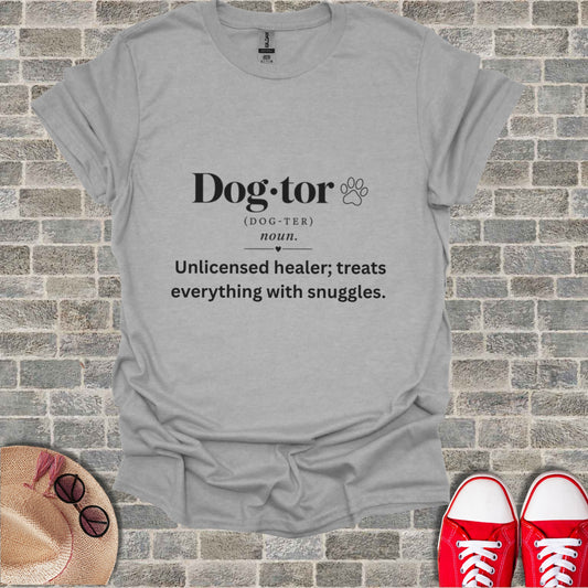 Grey t-shirt with "Dog-tor" definition: Unlicensed healer; treats everything with snuggles.