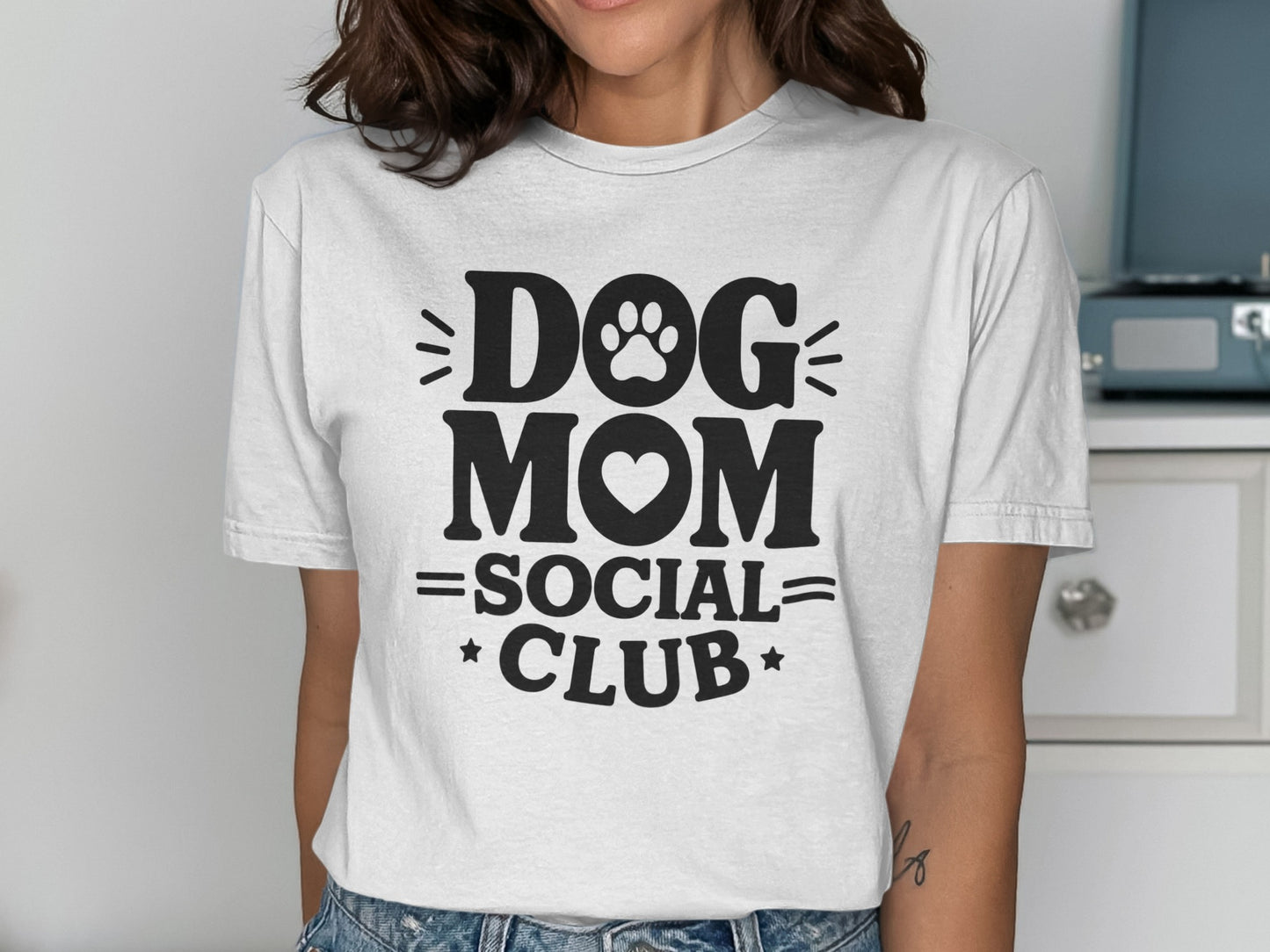 White t-shirt with black text reading "DOG MOM SOCIAL CLUB".