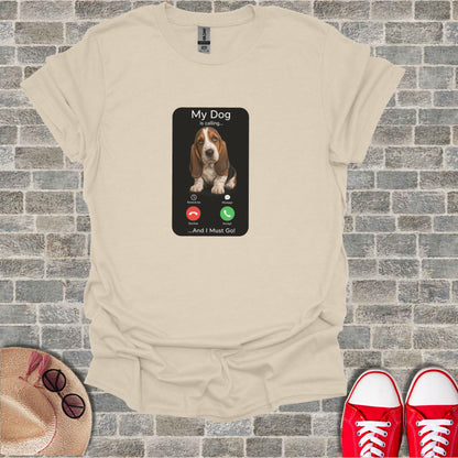 Cream t-shirt with "My Dog is calling..." graphic and phone call buttons.