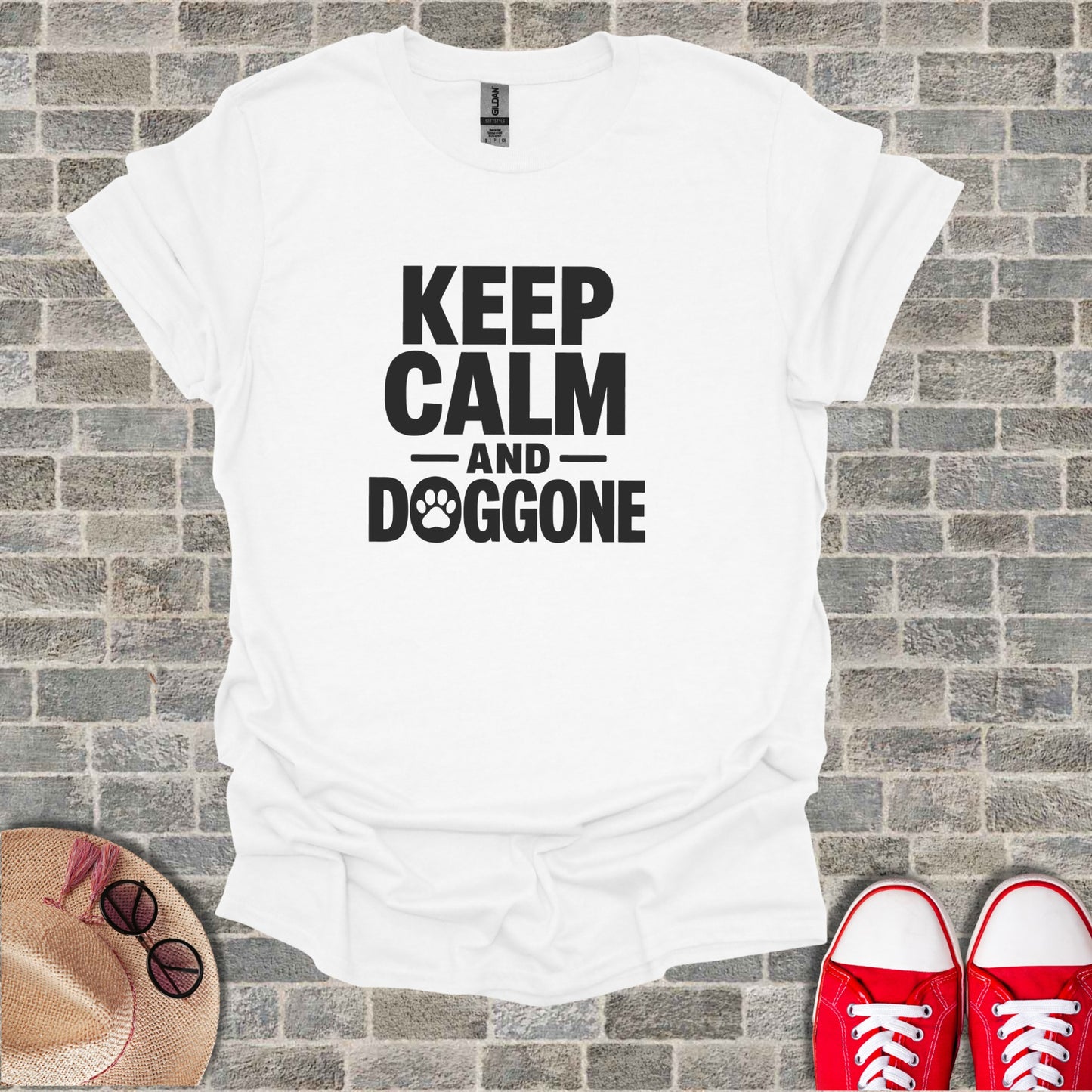 White t-shirt with "Keep Calm and Doggone" text and paw print.